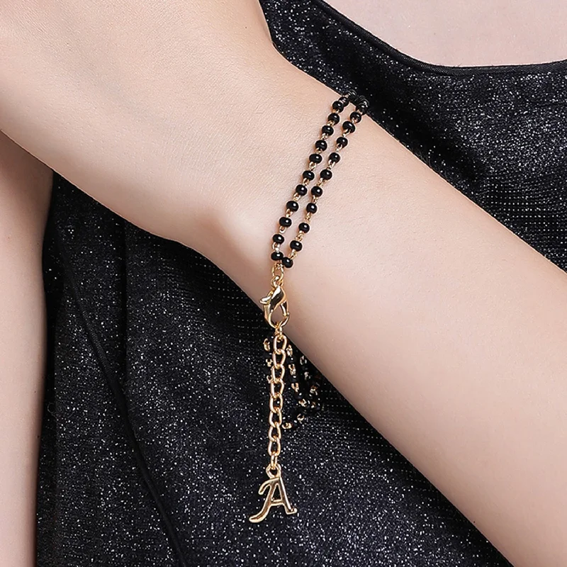 silver bracelet with floral pattern-Estele Gold Plated Fascinating "A" Alphabet with Black Beads Bracelet for Women