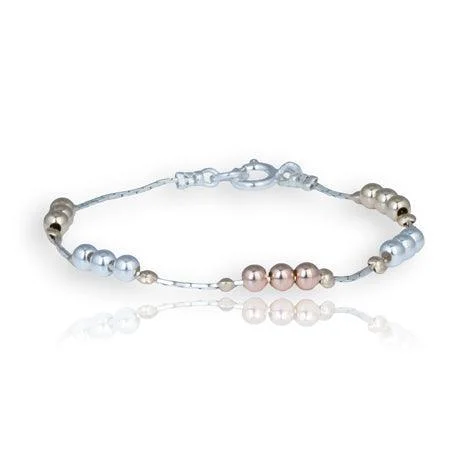 silver bracelet with intricate pattern-Lavan Gold and Silver Beaded Bracelet